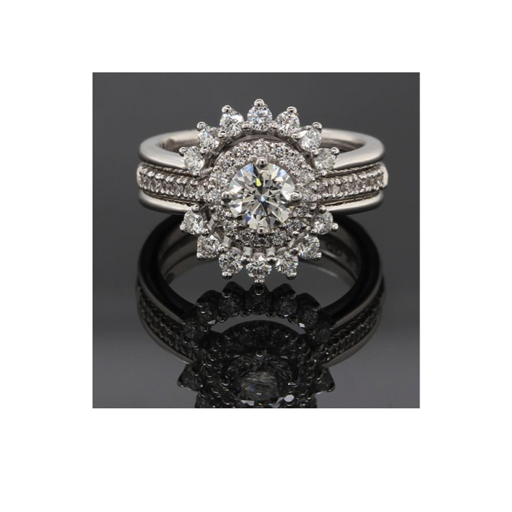Luce De Sol round halo centered engagement ring