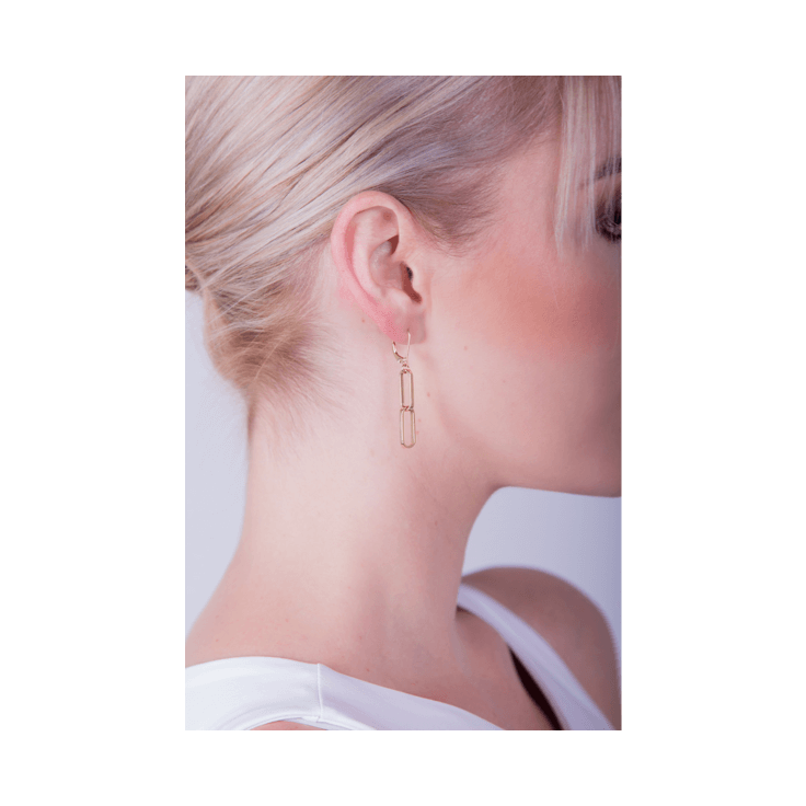 Paperclip Hoop Earrings on woman